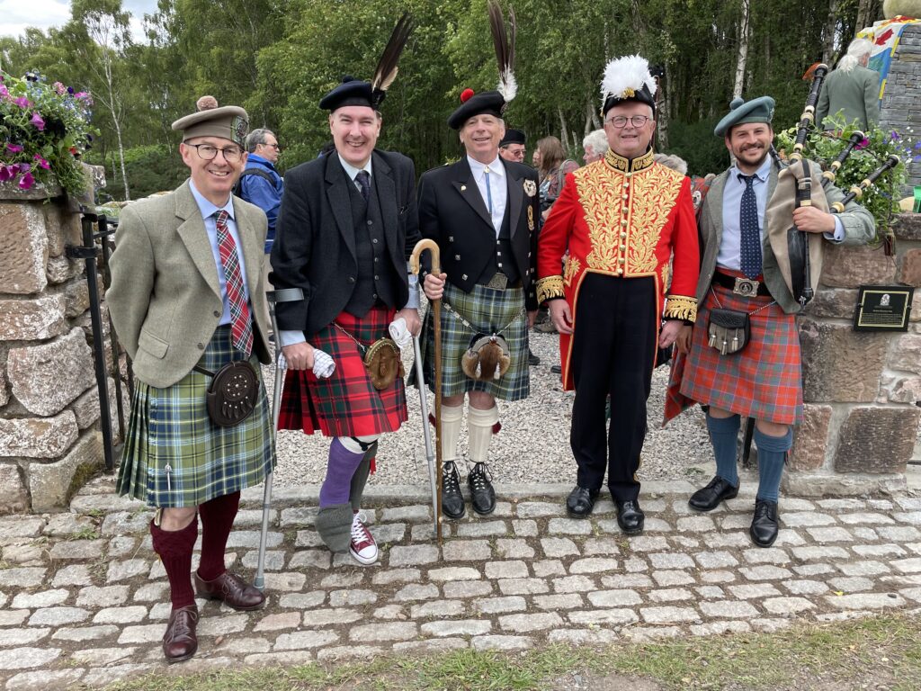 Left to Right: Philip Beddows, Seanachaidh to Clan MacBean, John Mackintosh of Mackintosh, President of Clan Chattan, Richard McBain of McBain, Chief of Clan MacBean, The Rt Hon Dr Joseph Morrow CVO C