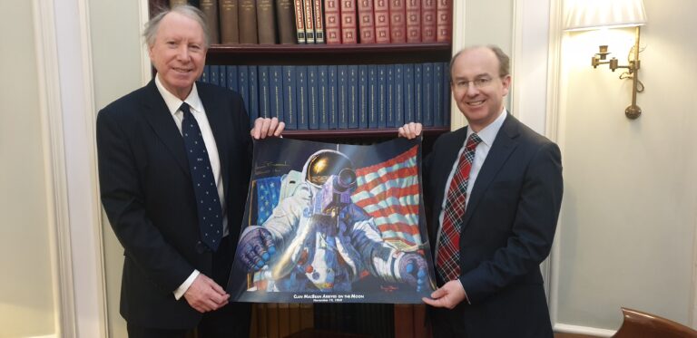 Philip Beddows presenting a print to Ian Fletcher, Trustee of The Caledonian Club, on behalf of Clan MacBean, 4 March 2020